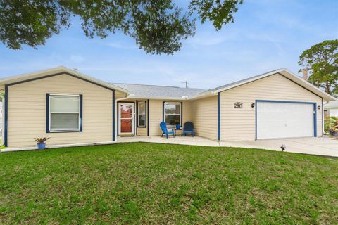 Photo of 2910 Yule Tree Drive, Edgewater, FL 32141 (MLS # FC310365) Photo of 2910 Yule Tree Drive, Edgewater, FL 32141 (MLS # FC310365)