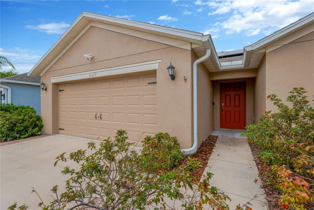 Photo of 8529 Hunters Fork Loop, Ruskin, FL 33573 (MLS # TB8510005)