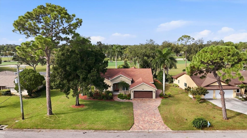 Photo of 5210 Inverness Drive, Sarasota, FL 34243 (MLS # A4704577)