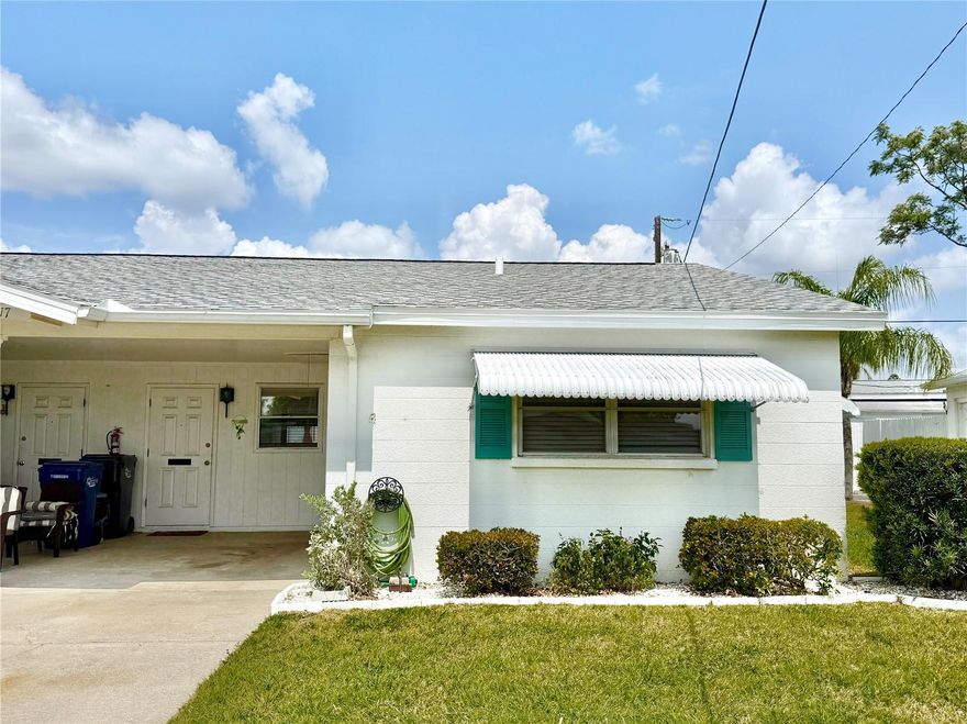 This end unit 2 bedroom, 1 bath villa has new vinyl plank flooring throughout and new doors. Storage includes 2 walk in closets, a linen closet, and additional attic storage accessible with pull down steps. The north facing patio provides a comfortable outdoor space and enough room for a grill, making it a pleasant shaded hangout. This unit is steps away from one of the 2 laundry rooms in the park. Parkway Villas is a 55+ community with a clubhouse with saunas, and a heated pool. The location allows for convenient access to many popular destinations: approximately 8 miles to Anna Maria Island, 7 miles to downtown Sarasota, 6 miles to downtown Bradenton, 4 miles to SRQ Airport, 2 miles to IMG Academy, and less than half a mile to shopping, library, and local restaurants.