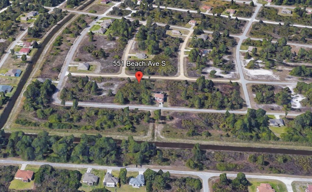 Photo of 551 Beach Avenue S, Lehigh Acres, FL 33974 (MLS # TB8450303)