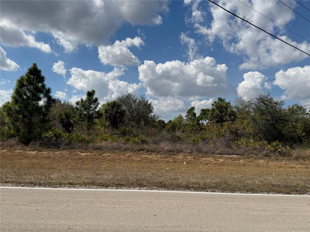 Photo of 524 Columbus Boulevard S, Lehigh Acres, FL 33974 (MLS # TB8478809)