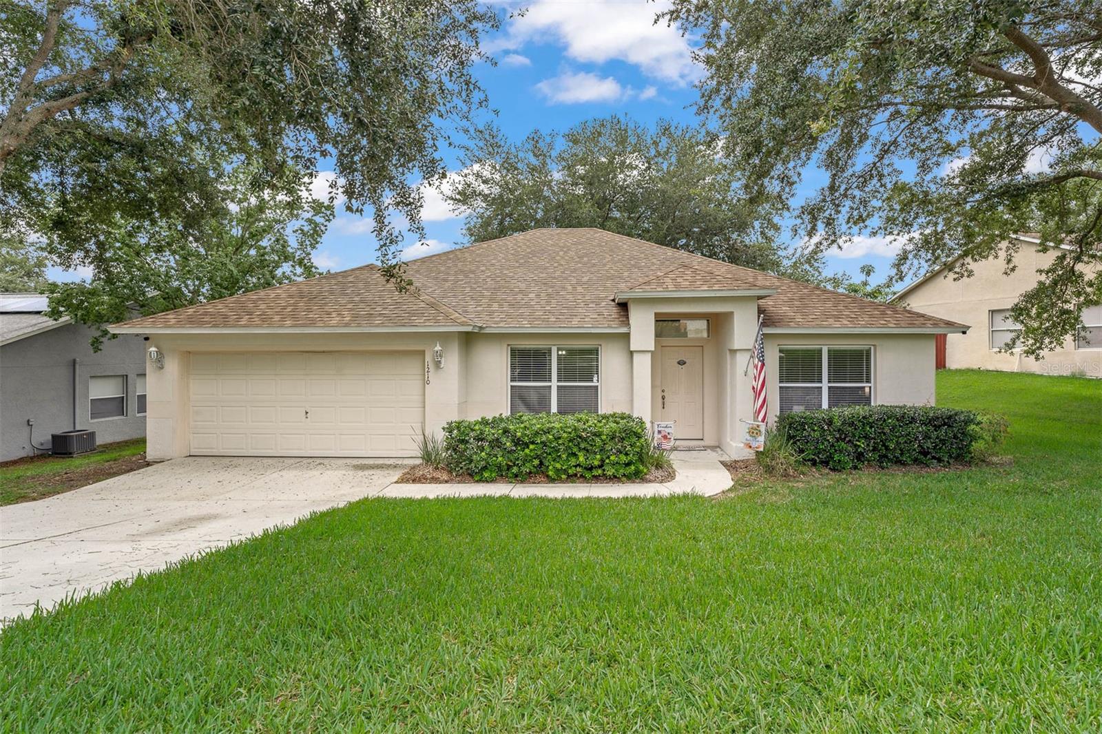 Welcome to your dream home in the highly desirable community of Oak Valley! You will love this beautifully maintained 3-bedroom, 2-bath home that offers the perfect blend of comfort, style, and the relaxed Florida lifestyle. Step inside to discover a spacious, open-concept layout featuring a large living room, and elegant dining area. This well maintained home is ideal for both everyday living and entertaining. The kitchen is a chef's dream and standouts, with beautiful countertops, stainless steel appliances, and plenty of cabinetry space and large pantry that makes meal prep a breeze. The split floor plan offers a master suite that provides a peaceful retreat, while two additional bedrooms offer ample space for family or guests. Both bathrooms are tastefully designed for comfort and functionality. Step outside to your own private backyard that is fully fenced. You will have an open patio area that is the perfect setting to relax and enjoy a beautiful Florida evening or lively weekend gatherings under the stars. Oak Valley offers nearby parks, walking trails, and the renowned Lakeridge Winery & Vineyard just minutes away,