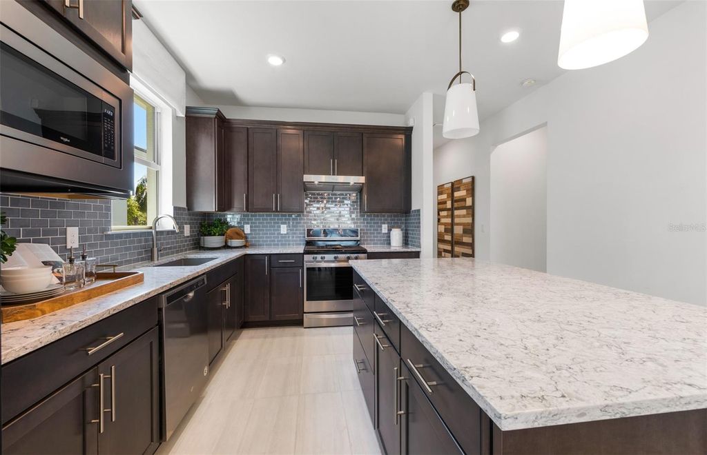 Photo of 10495 Abaco Falls, Englewood, FL 34223 (MLS # TB8440129)