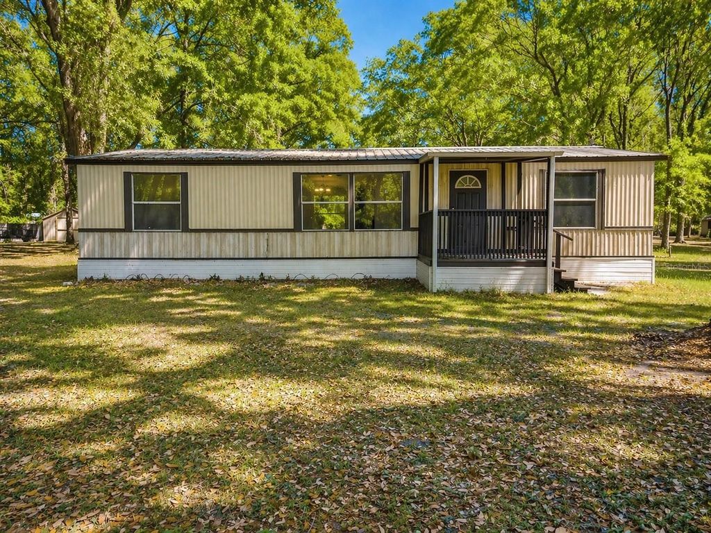 Photo of 2414 NW 121st Avenue, Gainesville, FL 32609 (MLS # GC539598)
