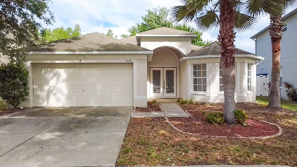 Photo of 3229 Dunstable Drive, Land O Lakes, FL 34638 (MLS # W7884562)