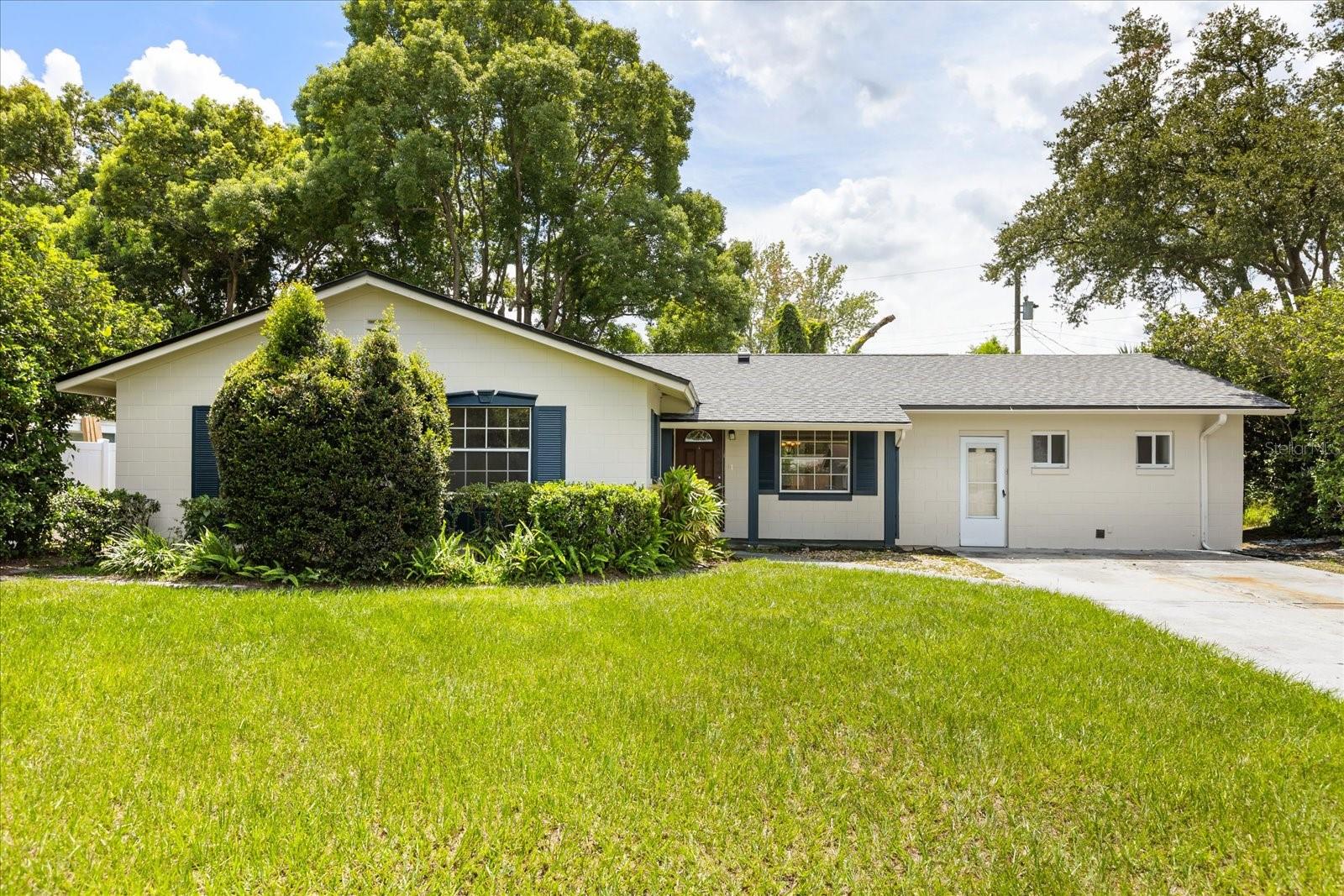 Rare opportunity in a quiet Winter Park neighborhood! This oasis home offers nearly 2,000 sq ft of living space PLUS a fully equipped studio apartment with private entrance, kitchenette, full bath, fireplace, separate A/C, and generous storage—ideal for guests, multi-generational living, or rental income.
The main home features a freshly painted interior and exterior, new LVP flooring throughout, and a completely remodeled kitchen with new appliances. The primary suite includes an en suite bath that has been remodeled, and three additional bedrooms provide ample space for family or home office needs. Enjoy the Florida room overlooking a fenced, private backyard, perfect for entertaining.
Roof replaced in 2024. A/C replaced in 2016. Zoned for top-rated Winter Park High School and conveniently located near Park Ave, shopping, dining, Costco, and major roadways. Move-in ready with room to personalize. Don't miss this versatile and rare Winter Park find!