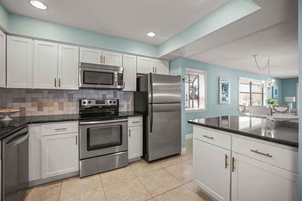 Photo of 2113 Hammock Pine Boulevard #2113, Clearwater, FL 33761 (MLS # TB8485882)