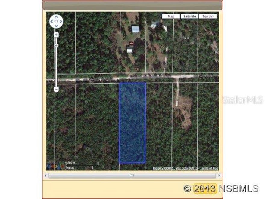 Quail Roost Ranches is perhaps one of the coziest communities in all of New Smyrna Beach. This land is far from any urban development and is surrounded by numerous acres of lushly green foliage and one major interstate that still manages to provide easy access to the rest of the city. The lot is approximately 5 miles from Tomoka Farms Road, Route 415. The New Smyrna Speedway is a nearby attraction. This parcel is directly across the road from #3983 Swamp Deer Road. Lot size is 160 feet on Swamp Deer, 523 feet long and 161 feet in the rear. It is within close proximity to Lake Ashby, a popular waterfront park offering many outdoor recreational opportunities, including canoeing, fishing, walking and simply enjoying nature. Angling is permitted from the boardwalk and along the shore. Additionally, a launch site for personal watercraft is available off Commercial Avenue. This 64-acre rural park includes primitive tent camping, a playground, volleyball court, nature/horse trails, boardwalks, fishing pier, grills, and pavilions with picnic tables. It also offers a free public boat ramp nearby.; Cleared: No ;Water: Holding Tank