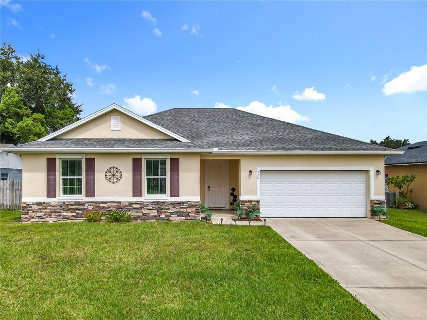 Welcome to this stunning home! Featuring 3 bedrooms, 2 bathrooms, and 1,588 sq. ft., this 2019 property has been exceptionally well maintained and showcases elegant finishes throughout. Enjoy tile flooring in every room, beautifully tiled bathrooms from floor to ceiling, and a modern kitchen with granite countertops. Additional upgrades include gutters, a fenced yard, and an extended front entry for extra curb appeal. Ideally located just minutes from shopping centers, dining, and entertainment, and very close to the Poinciana community center with gym and swimming pool, this home offers both style and convenience. Conveniently located approximately 40 minutes from Walt Disney World, depending on traffic, making it ideal for day trips to the theme parks. Don’t miss out—schedule your private showing today! This home won’t last long on the market!