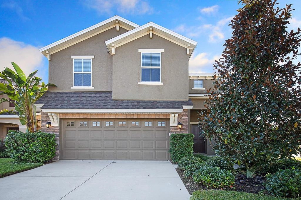 Photo of 16016 Persimmon Grove Drive, Lithia, FL 33547 (MLS # TB8390650)