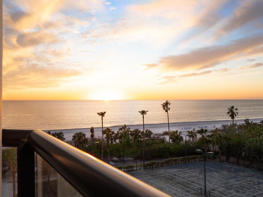 Introducing an exceptional beachfront residence that defines luxury living on Longboat Key. With breathtaking gulf-front sunset views, this three-bedroom, four-bath retreat spans over 3,000 square feet under air, offering an unparalleled coastal lifestyle. Move-in ready and elegantly appointed, this residence features stunning modern light fixtures, fresh interior paint and stylish coastal furnishings. The primary suite is a private sanctuary, boasting a spacious walk-in closet, a secluded beachfront terrace and dual baths. On opposite end of the home, a deluxe en-suite guest room with a large walk-in closet awaits, along with a versatile third guest room, office or den, complete with a full bath across the hall. Designed for functionality and style, the gourmet kitchen has been renovated to open seamlessly to the great room, while allowing for breathtaking beach and gulf views. Highlights include solid wood cabinetry, stone countertops, a center island, a built-in dining table and a cozy breakfast nook overlooking the beach. The spacious great room offers endless configuration possibilities and direct access to the main balcony. A semi-private elevator provides effortless access to some of Longboat Key’s desirable amenities, including impeccable concierge service, an 18,000-square-foot clubhouse featuring a fitness center, spa, game room, library and ballroom, a heated beachfront pool and spa, fire pit courtyard, Har-Tru tennis courts and 24-hour gated security for ultimate peace of mind. Set on 16 acres of lush tropical landscaping, Water Club boasts 680 feet of private beachfront and welcomes pets. This premier beachfront community offers the best of island living including golfing, boating, unique boutiques, exceptional dining, and the arts and entertainment of downtown Sarasota just minutes away. Experience the pinnacle of coastal luxury at Water Club where every day is a celebration of Longboat Key’s beauty and serenity.