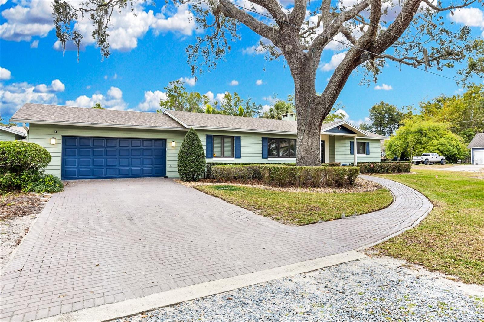 Executive rental pool home located in the charming town of Windermere! The location is just two block from Main st and all that downtown Windermere has to offer! This single-story, 4-bedroom (2 primary bedrooms), 3-bathroom home, sits on an oversized corner lot in the shade of majestic oak trees. Enjoy a gourmet kitchen featuring stainless steel appliances, two brand new refrigerators, a professional gas range, granite countertops, subway tile backsplash, and a breakfast bar with seating space. The adjacent family room has a tongue and groove wood ceiling, Saltillo tile flooring and is bright with plenty of natural light pouring in from its large windows and two skylights. The primary bedroom and ensuite features a double vanity, garden tub, and separate shower. Large walk in closet and dressing area. Sliding glass doors lead to a private patio with fountain and pool access. The beautiful lagoon style lap pool has a brand-new pool heater and is perfect for those cooler days. The pool area is complete with a screen enclosure, paver decking and walkway that leads to the back patio. There is an oversize, newly renovated laundry area with plenty of room for extra storage and laundry day activities. Separated by the main house are the other 3 bedrooms, one is an ensuite primary with their own patio. It has a new Generac generator that is powerful enough to cover the entire house during a power outage. This home offers a true Windermere life style, Close to tennis courts, boat ramps on the Butler chain of Lakes, playgrounds, and highly rated schools! The Windermere Downtown area is walkable, offering an array of shops, restaurants, and the weekly Downtown Farmers Market!