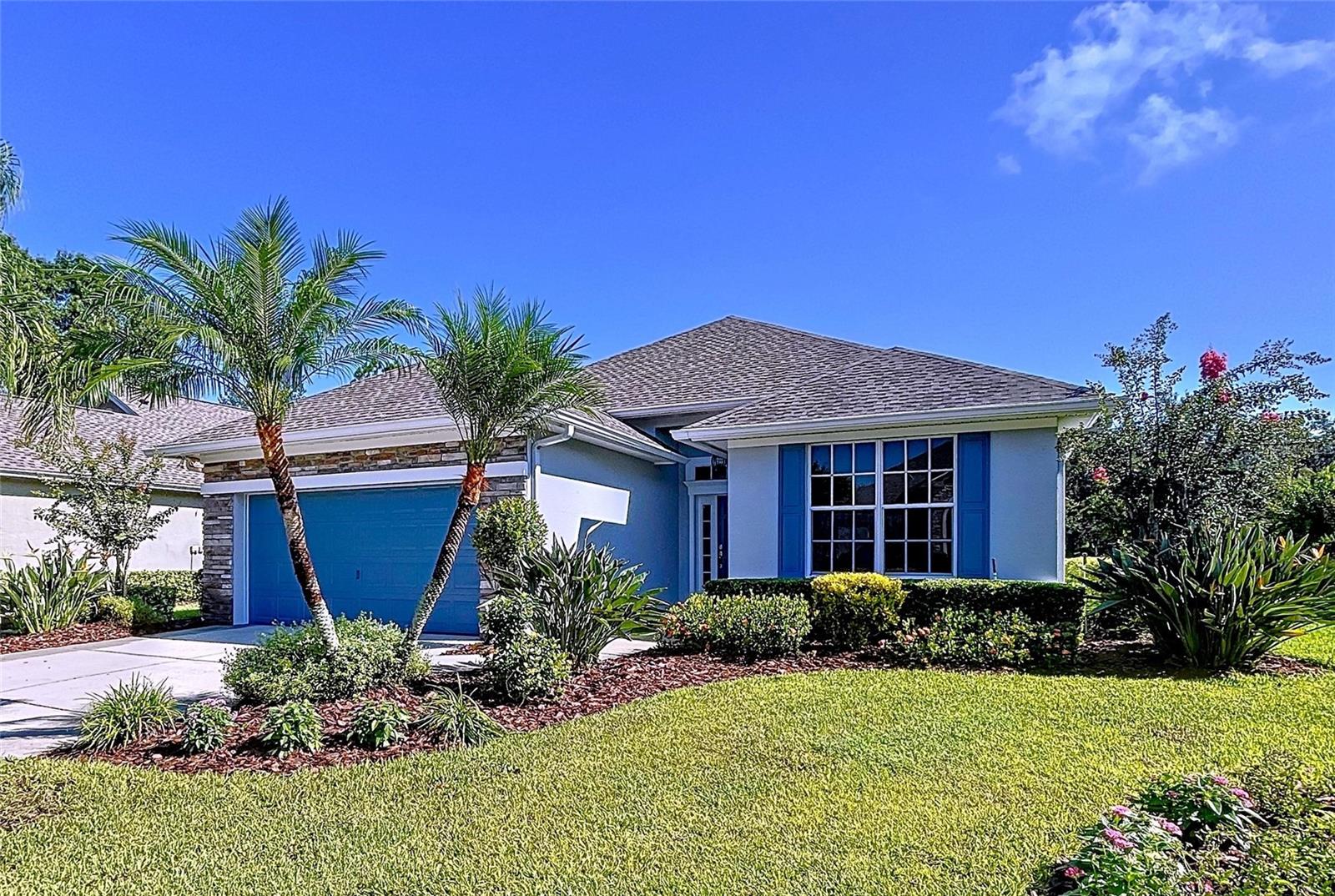 Welcome to the sought-after 55+ gated community of Lake James in North Lakeland, where every day feels like a retreat. This spectacular one-owner home is a true gem, offering the perfect blend of comfort, convenience, and just the right amount of “wow” factor. Conveniently located near the community entrance, you’ll enjoy being only a short stroll away from the community mailbox, sparkling heated pool, and clubhouse—yes, getting your mail and then taking a refreshing swim could easily become your new routine! This “like-new, move-in-ready” home features 2 beds, 2 full baths, and an attached 2-car garage. The exterior has been freshly painted, and the garage floor now sparkles with a professional epoxy finish that just might make you smile every time you pull in. The landscaping has been meticulously cared for and kept lush with a multi-zoned sprinkler system, and the front entry and rear patio have been sealed for a crisp, clean finish. Step into the backyard retreat and you’ll find a large screened patio overlooking a peaceful pond and paved walking path—perfect for morning coffee, afternoon reading, or simply enjoying the Florida sunsets without any pesky mosquitoes. Inside, this former model home is brimming with thoughtful upgrades. Crown molding, tray ceilings, plant shelves, and built-ins create an elegant yet inviting atmosphere. The kitchen is a dream for anyone who loves to cook—or simply enjoys a beautiful kitchen—with granite countertops making the home feel bright and cheerful, ample cabinet space, newer appliances, and even a little extra storage in the laundry room just off the kitchen. Whether you’re whipping up a gourmet dinner or simply reheating last night’s leftovers, this kitchen makes everything look good. The seller has gone above and beyond to prepare this home for its next owner. Updates include a brand-new architectural shingled roof that is less than a year old, fresh interior and exterior paint, updated toilets in both bathrooms, and a recently replaced water heater. The garage floor has been upgraded with an epoxy finish, the front entry and patio have been sealed for durability, and the HVAC system is newer and has been serviced regularly. The entire interior has also been professionally cleaned from top to bottom, so it’s truly ready for you to move right in without lifting a finger. Lake James itself is more than just a neighborhood, it’s a lifestyle. The community takes care of lawn maintenance, lawn spraying, cable, and internet, freeing you from chores and giving you more time to enjoy the good life. The resort-style clubhouse features a heated pool, fitness center, and plenty of space to socialize with friends and neighbors. A paved walking trail winds through the community, giving you the perfect excuse to get your steps in while catching up on the latest neighborhood news. Beyond the gates of Lake James, you’ll love how convenient the location is. Shopping, dining, and recreational opportunities are all nearby, and with easy access to I-4, you can be in Tampa, Orlando, or even one of four nearby airports within reach making travel a breeze. Of course, you may find yourself so content here that you rarely want to leave! This home is truly a rare find—a perfect balance of low-maintenance living, stylish upgrades, and a welcoming community atmosphere. Schedule your private showing today and come see why this is more than just a house—it’s your next chapter waiting to be written.