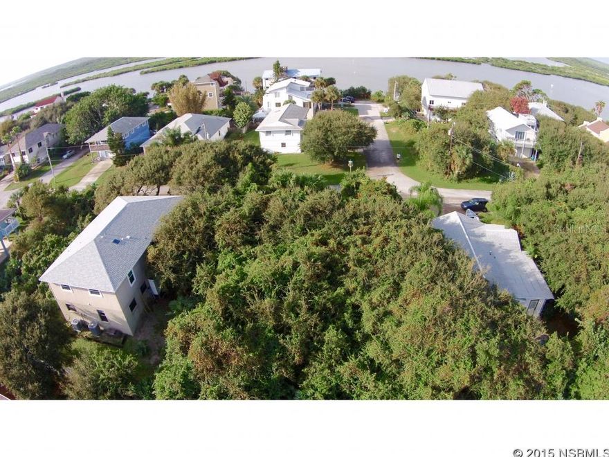 Build your beachside dream home just a short walk to beach and river. Review set of plans available for a 3-story residence with 1944 sq. ft. of living area, 922 sq. ft. of deck area and 1056 sq. ft. of ground floor open area for a total of 3920 sq. ft. total residence. Enjoy river and ocean views.; Cleared: No