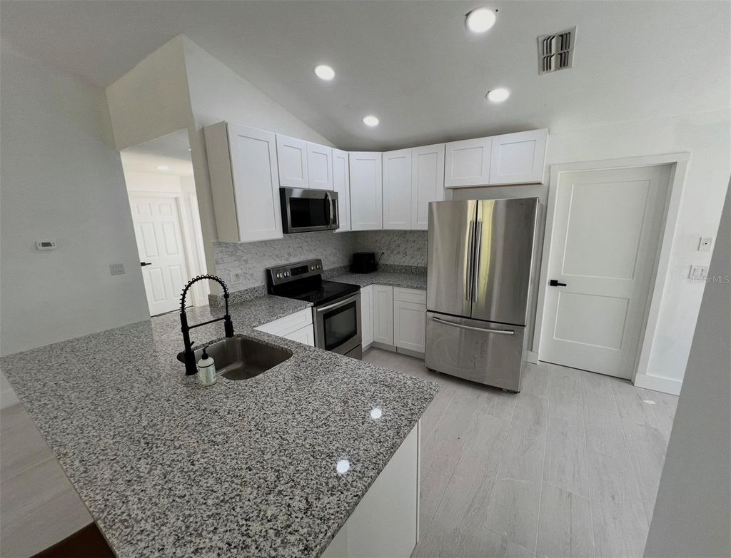 Photo of 12824 Dunhill Drive, Tampa, FL 33624 (MLS # TB8480462)