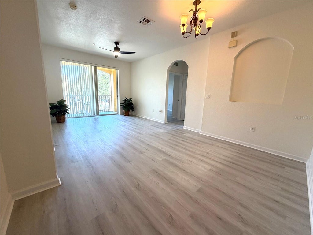 Photo of 6335 Contessa Drive #201, Orlando, FL 32829 (MLS # O6417812)