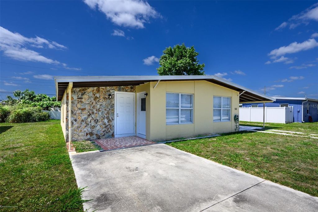 Photo of 510 Sharon Circle, Port Charlotte, FL 33952 (MLS # C7525562)