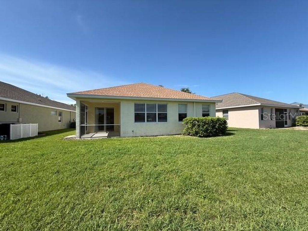 Photo of 1823 Scarlett Avenue, North Port, FL 34289 (MLS # A4669869)