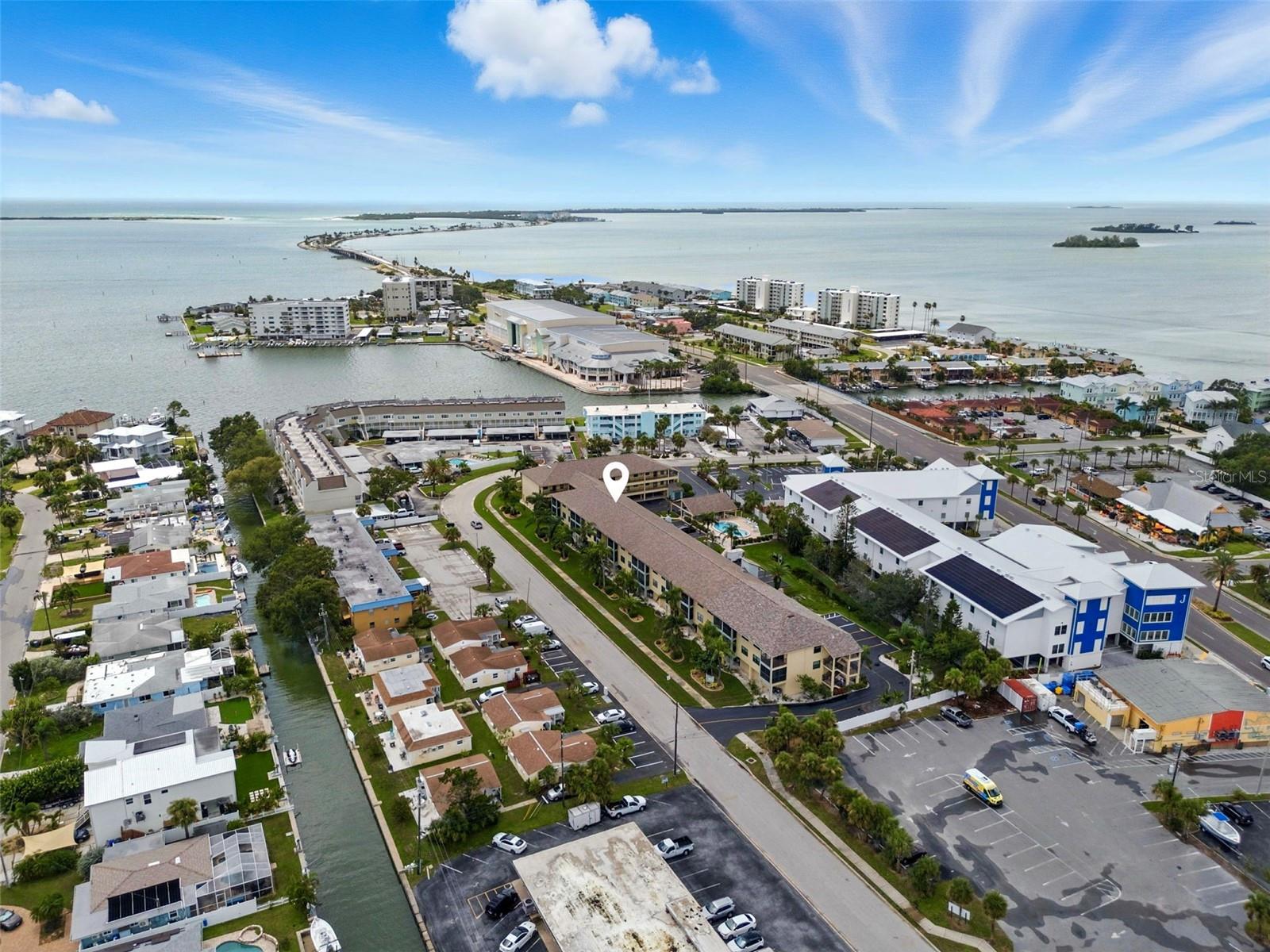 Picture yourself in the heart of sought-after Dunedin, just a stone’s throw from the shimmering water and minutes from the sugar-sand shores of Honeymoon Island. This beautifully updated and fully furnished 2-bedroom, 2-bathroom condo — featuring hurricane-impact windows for peace of mind and year-round protection — is the perfect year-round residence or a dreamy second home in paradise.
Inside, you’ll discover coastal charm at every turn — soaring cathedral ceilings, plantation shutters, and a desirable split floor plan for added privacy. The stylish, light-filled interior blends comfort and sophistication, making it easy to relax after a day on the water or entertain friends with ease.
This condo also offers two coveted under-building parking spaces, a generous 8' x 7' private storage room, and access to wonderful community amenities, including a sparkling private pool and a welcoming community room — ideal for social gatherings or quiet afternoons with a good book.
Step outside and you’re just moments from Dunedin’s vibrant downtown, where charming boutiques, art galleries, and acclaimed restaurants await. Waterfront parks, scenic trails, marinas, and the award-winning beaches of Honeymoon Island are all right at your doorstep.
With its unbeatable location, thoughtful updates and true turn-key convenience, this coastal retreat invites you to start living the Florida lifestyle you’ve been dreaming of.