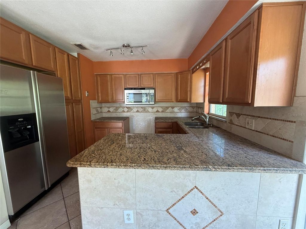 Photo of 5710 Joyce Street, Orlando, FL 32839 (MLS # O6411076)