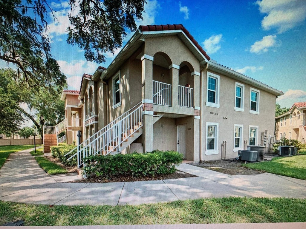 Photo of 2838 Osprey Cove Place #204, Kissimmee, FL 34746 (MLS # S5157016)