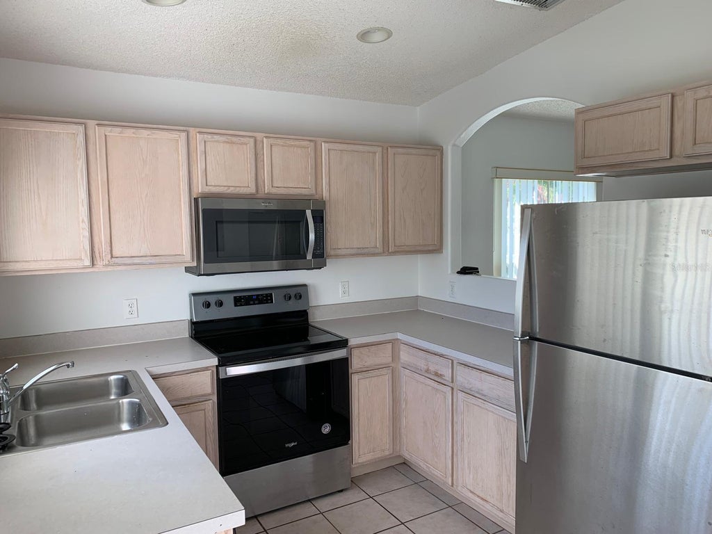 Photo of 2838 Osprey Cove Place #204, Kissimmee, FL 34746 (MLS # S5157016)
