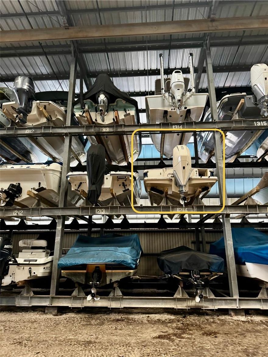 Welcome to Slip #1214 at The Boathouse on Longboat, a rare opportunity on the coveted south end of Longboat Key! This is your chance to secure a covered, hurricane-protected slip in one of Sarasota's most desirable waterfront communities PLUS the price includes a 2018 Robalo R18 with a Yamaha 150 motor, recently detailed tuned up for one-stop shopping! This premium slip accommodates boats up to 31.5 feet in length, with a maximum height of 8' 4" and an 8' 6" beam (No T-tops unless collapsible). Enjoy first-class service at an affordable monthly rate with unbeatable amenities. Located just minutes from both Sarasota Bay and the Gulf, this facility offers on-site fuel, restrooms, a ship store, maintenance services, leasing assistance, and even the popular Dry Dock Waterfront Grill restaurant on site. Simply call ahead and your boat will be launched, fueled, and waiting for you. At the end of the day, return to dock and watch as the team expertly rinses and stores your boat in its covered slip. This is more than boat storage, it's effortless boating in paradise. Don't miss your chance to own high and dry covered storage on Longboat Key!