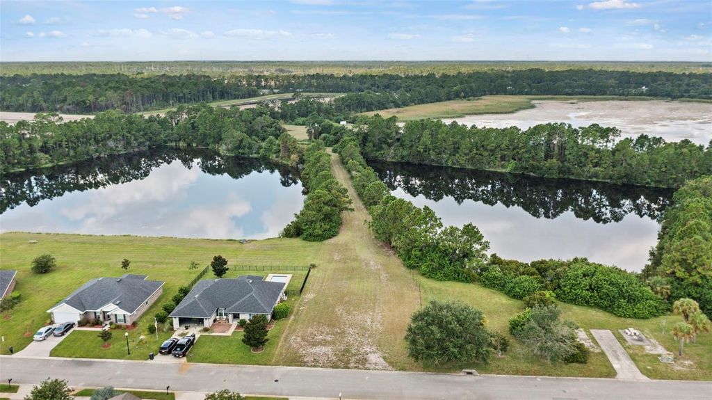 Photo of 38 Eagle Lake Drive, Flagler Beach, FL 32136 (MLS # FC315692)