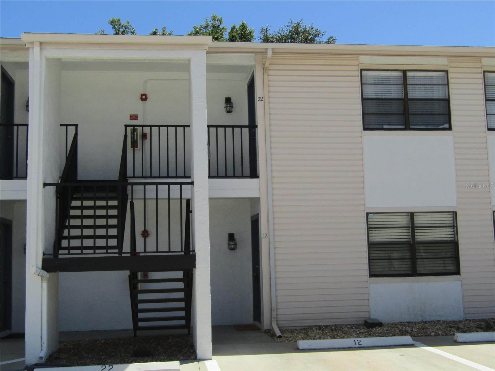 Location, Location! This newly updated 2 bedroom, 1 bath home is located just minutes from SoHo and beautiful Bayshore Blvd. and only blocks from many restaurants, shopping, parks, Mitchell elementary, Kennedy Blvd., I-275 for quick access to Downtown Tampa, Raymond James stadium, University of Tampa, Armature Works, Channelside, Tampa International and the sparkling waters of Tampa Bay! This unit boasts high end Walnut LVP floors with new, stylish ceramic tile in the kitchen and bath which have been updated top to bottom with refreshed cabinets and gorgeous premium grade granite counters in both. There is a brand-new stainless refrigerator and new, deep stainless sink and modern faucet. This home is freshly painted throughout and includes a stacked washer/dryer tucked into a utility closet located on the rear patio. The a/c was replaced in 2019, and the water heater was replaced in 2020. This is a small, close community of with a wonderful, gated pool area for your enjoyment and to entertain your family and friends. There's nothing to do but start enjoying the convenient, active lifestyle of South Tampa!