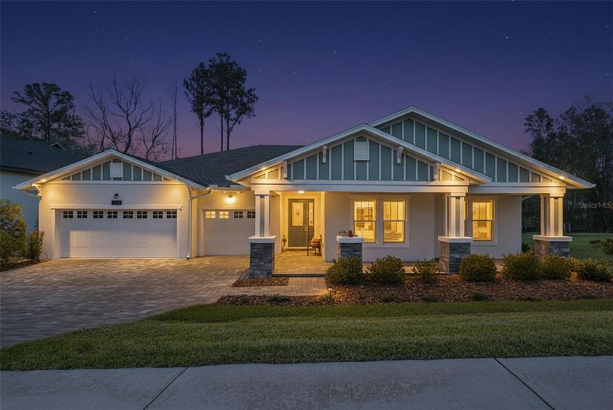 Welcome to the highly sought after golf course community of Southern Hills! This 4 year old one story Craftsman style build sits on a huge 0.4 acre lot and is loaded with upgrades. The CDD bond has been paid off on this home! You are greeted upon driving up to a fully pavered driveway and front porch, and a large 3 car garage. Natural light is abundant in this home from the minute you step through the front door. High ceilings make this home feel spacious and airy. This completely open floorplan has the living room, kitchen, and dining room all tied cohesively in the center of the home - perfect for entertaining! This elegant kitchen includes Quartz countertops, stainless steel appliances, a built-in oven, an oversized island with plenty of seating, and a built-in pantry. The primary suite includes a large en suite bathroom featuring a seamless entry shower, double vanities, a soaking tub, and 2 huge walk-in closets. All of the bedrooms and bathrooms are on completely different corners of the house for ultimate privacy. This beautiful build includes 2 outdoor covered patios, one of which is screened with stackable sliding glass doors, and pre-plumbed for an outdoor kitchen! This oversized fully fenced backyard offers privacy and plenty of space to expand the patios or add a pool! Additional upgrades in this home include: plantation shutters, tankless water heater, irrigation in both the front and back yards, tray ceilings in the living room and primary bedroom, in-wall pest control system, and gutters all the way around with a leaf prevention screen. The spacious 3 car garage is perfect for multiple cars and a golf cart, and features additional storage inside as well. Not only is Southern Hills home to one of the most prestigious golf courses in Florida, it also features some incredible amenities including a resort style pool, Har-Tru tennis courts, pickleball 2 restaurants, multiple bars including a pool bar, a driving range, gym, a 24/7 security gate, and more! Easy access to the Veterans Expressway, I-75, Major hospitals, and just 45 minutes to Tampa International Airport.