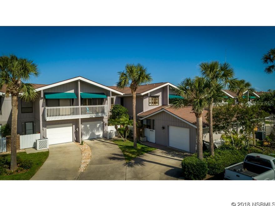 Take a deep breath and relax in this carefully remodeled waterfront retreat, complete with a deeded boat slip. No expense was spared with over $100,000 in renovations, this home exemplifies the New Smyrna Beach lifestyle with a meticulous mix of beachside vigor and classic beauty.Settled in a quiet cul-de-sac in between historic Canal Street and vibrant Flagler Avenue, itâll feel like paradise as soon as you step into your private patio. Enjoy breathtaking waterfront views from the moment you walk into your beachside abode. Every detail has been painstakingly considered from beautiful, dual-shade window treatments to custom-designed geometric railing. Your kitchen boasts granite countertops, roll out pantry shelving, recent stainless steel appliances and thoughtful lighting with views to both your gated sanctuary and the glistening bay. The living space is the embodiment of light and bright with an abundance of room. Cozy up next to your fireplace or enjoy a cup of coffee with the sunrise over the water. A separate bonus space complete with a wine cooler allows you to entertain with a perfectly chilled beverage, or gives you flexibility as a third bedroom to comfortably house your guests with their own separate entrance. Step up into your loft to appreciate a book. Retire to your master suite to admire private views of the water from your balcony or unwind in your luxurious ensuite. Watch the manatees and dolphins from your porch or the community dock, or take a day off and take your boat for a cruise on the Intracoastal or river. Consider your search for a beachside oasis complete! ;Water: City