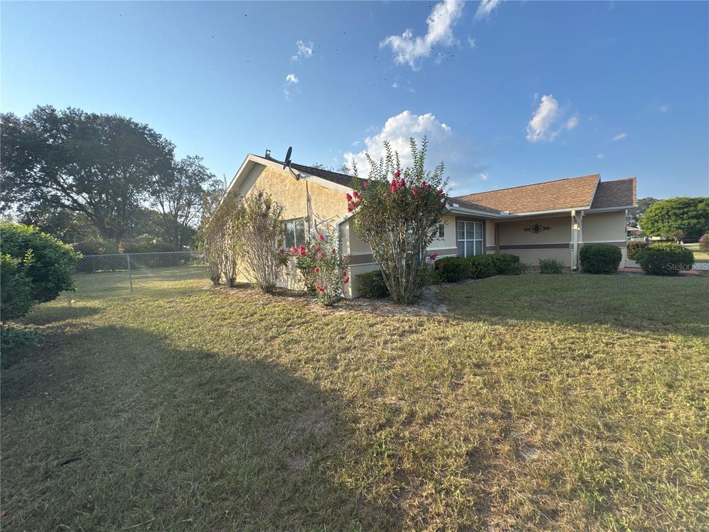 Photo of 5440 SW 100th Loop, Ocala, FL 34476 (MLS # OM709935)