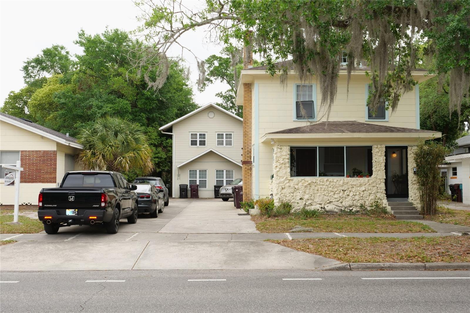 Rare Investment Opportunity in Downtown Orlando – Multi-Family Quad Unit! Don't miss out on this unique and highly lucrative investment property in the heart of Downtown Orlando! This multi-family quad unit is listed as a single parcel, yet consists of two separate structures, offering a total of four occupied units. All units come with renewed leases, providing immediate cash flow and a hassle-free investment opportunity. 413: 2 Bed, 1 Bath – Lease through 12/31/25 at $1500/month 415: 1 Bed, 1 Bath – Lease through 3/31/26 at $1345/month 417: 3 Bed, 2 Bath – Lease through 5/31/26 at $2075/month 419: 3 Bed, 2 Bath – Recently renovated, listed for rent at $2400/month Potential Rental Income: $7320/month This property is a turn-key investment with no additional upgrades needed. The units are well-maintained with a termite bond and pest control contract in place through 2025. The roofs were replaced in 2016 for units 413 & 415, while units 417 & 419 have a roof replaced in 2008. A 2024 appraisal supports the asking price, providing solid value for buyers. Key Features: Prime Downtown Orlando location Turnkey, fully-leased multi-family investment Excellent rental income potential Termite bond and pest control contract No additional investment required! This property is an exceptional opportunity for investors seeking stable cash flow in one of Orlando's most desirable areas. With long-term leases in place and great tenants, it's a perfect addition to any real estate portfolio.