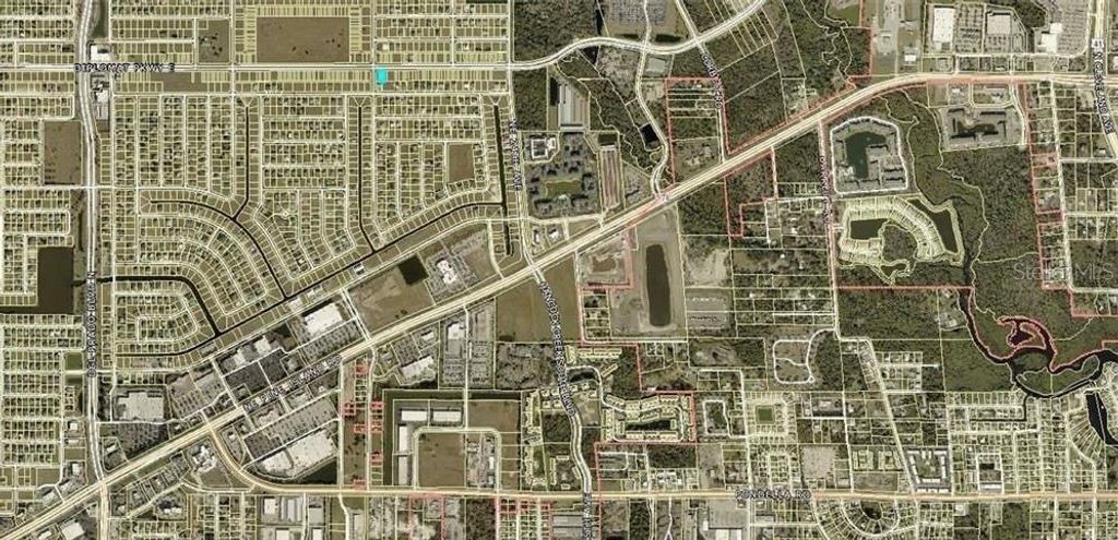 Photo of 2104 Diplomat Parkway E, Cape Coral, FL 33909 (MLS # C7526119)