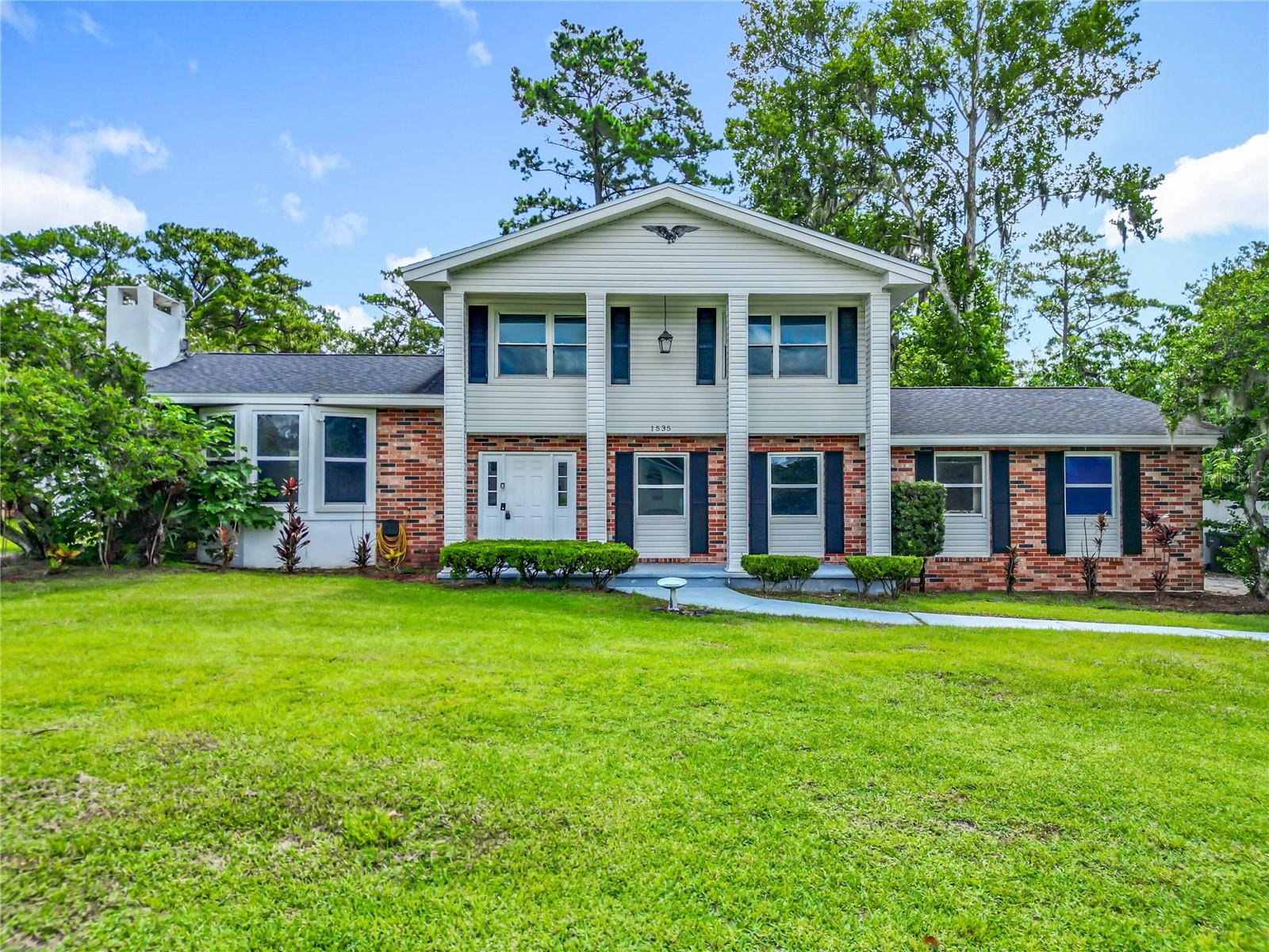 Charming 2-story Colonial-style home with 4 bedrooms and 2.5 baths, including one bedroom on the first floor. Features a formal living room, formal dining room, and a cozy fireplace. The updated kitchen includes wood cabinets, stainless steel appliances, and overlooks the in-ground pool and spacious fenced yard. Ideal for entertaining or relaxing. Home also includes a 2-car garage and is conveniently located near main roads, schools, and hospitals.