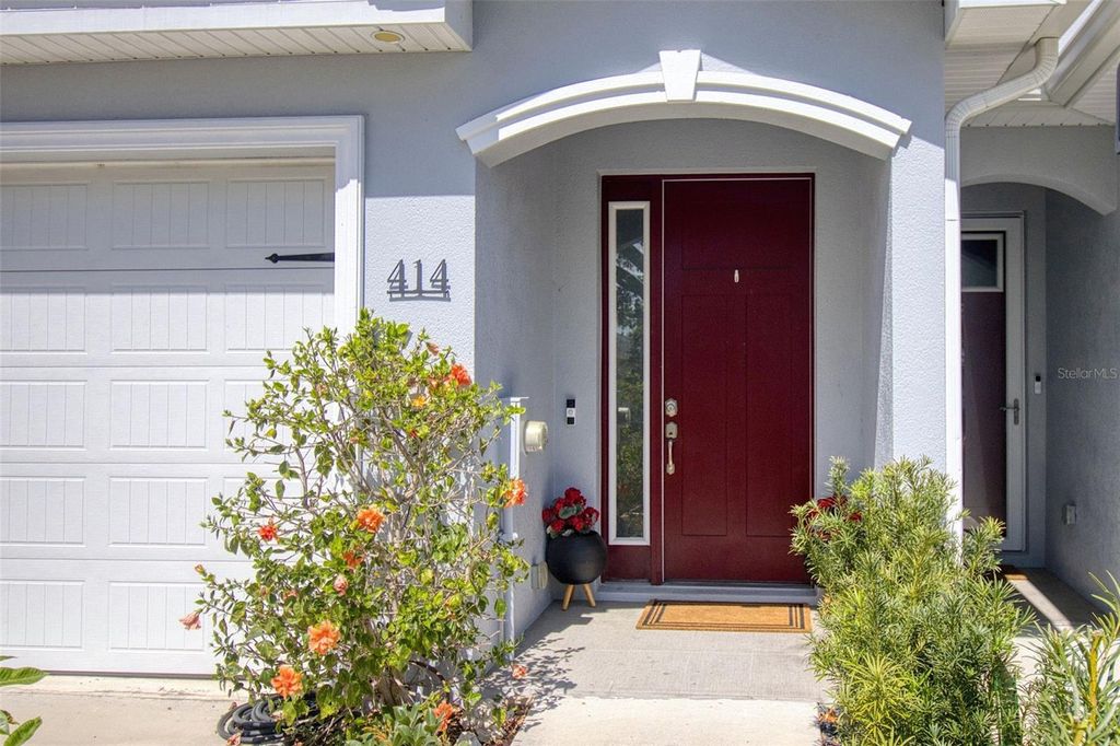 Photo of 414 Birdsong Lane, Dunedin, FL 34698 (MLS # TB8472991)