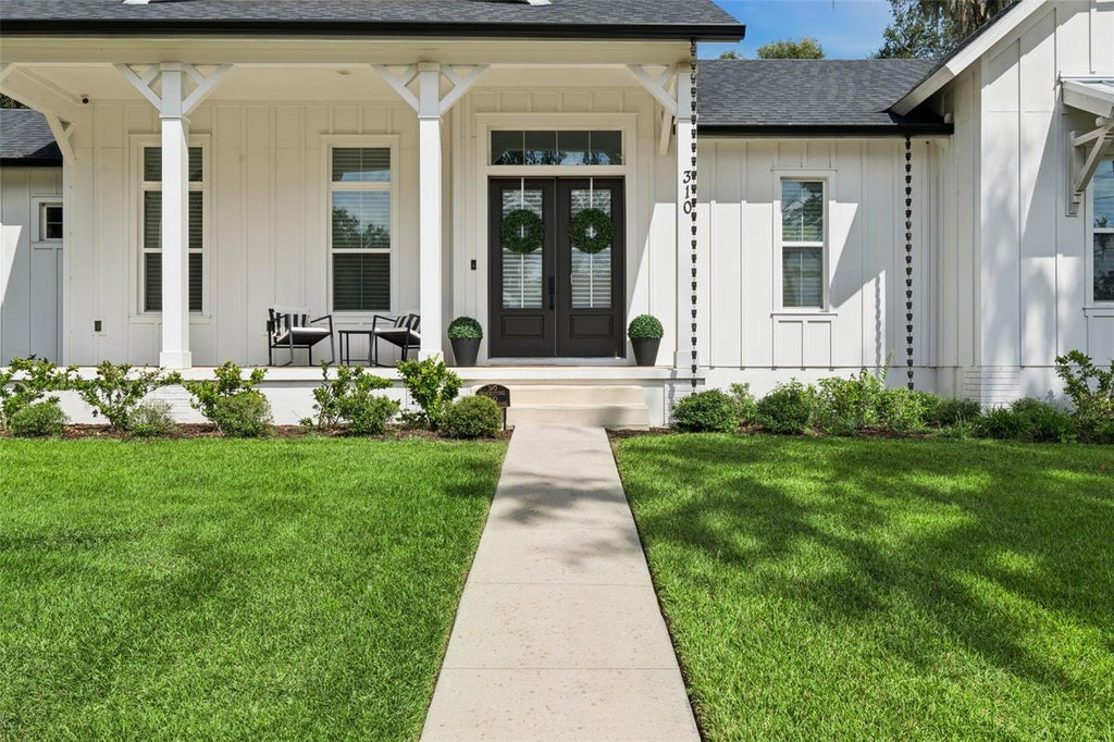 Photo of 310 W Washington Avenue, Lake Helen, FL 32744 (MLS # O6446485)