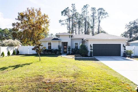 Photo of 55 Palmwood Drive, Palm Coast, FL 32164 (MLS # FC314458)