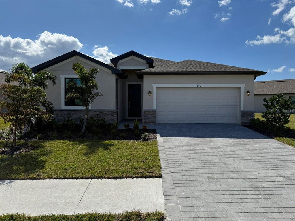 Photo of 1553 Saddlewood Circle, Port Charlotte, FL 33953 (MLS # C7514721)