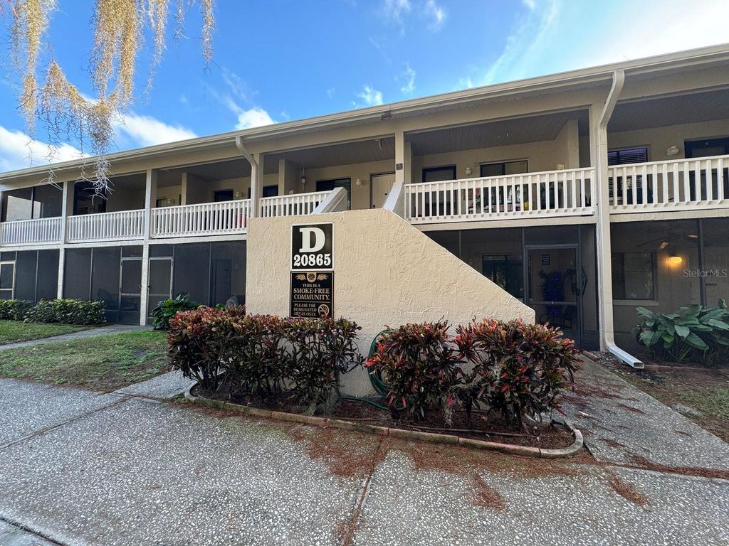 Photo of 20865 Haulover Cove #D-10, Lutz, FL 33558 (MLS # TB8425683)