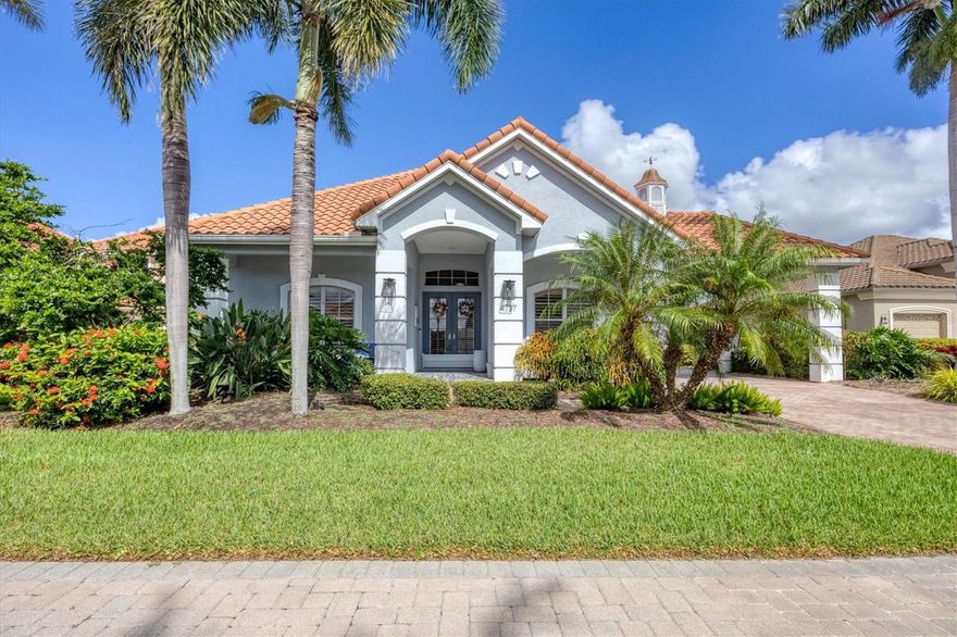 Furnished annual waterfront rental – renter’s paradise at Harbour Walk, The Inlets. Discover the ultimate Florida lifestyle with this contemporary, fully furnished, waterfront home available for annual lease in this sought-after boating community. Park your boat in the backyard after a scenic ride on the Manatee River, or a day anchored at Ana Maria Island. This home sits on an ideally positioned serene canal, making it a boater’s dream. Wave to neighboring boaters passing by from the spacious lanai, as you relax in the heated pool or hot tub. Fire up the natural gas, Blaze grill for a meal around the summer kitchen and firepit on the back patio. This spacious home features a bright, open layout with a split-bedroom floor plan and a versatile den/office that can serve as a fourth bedroom. The Jack & Jill bath is spacious and recently remodeled. Enjoy a primary king en suite, highlighted by the recently renovated, spacious bath with walk-in shower, double vanities and deep soaking tub. The new kitchen was fully remodeled this year and includes a massive island, stainless steel appliances, natural gas stove with hood and wine refrigerator. Enjoy movies on the 75-inch screen from the kitchen, in this well-integrated open living floor plan. The home is decorated with stylish, comfortable, contemporary furnishings made for relaxing times. A custom pool table completes the casual vibe while providing a great pastime to share with friends. The front porch is the ideal covered oasis for morning coffee or staying dry during a Florida rainstorm. A Culligan water purifying system for the entire house provides filtered drinking water as well as detoxified shower water. A newly installed HVAC provides maximally efficient temperature control. A two-car attached garage takes convenience to the next level. In one of Bradenton’s premier boating communities, Harbour Walk provides excellent amenities, kayak ramps, tennis courts, pickleball, walking trails, gated access and a playground. Its prime location provides easy access to Interstate 75, world-class beaches like Anna Maria Island, top-tier restaurants, shopping and multiple airports. Enjoy additional dining, entertainment and shopping in downtown Bradenton or nearby Lakewood Ranch and Sarasota. Lawn and pool maintenance are included. The boat lift can accommodate a 36-foot boat with a 13-foot beam and up to 20,000 pounds of displacement.
