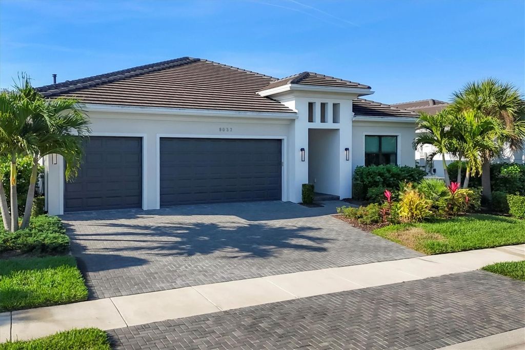 Photo of 9037 Bernini Place, Sarasota, FL 34240 (MLS # A4673979)