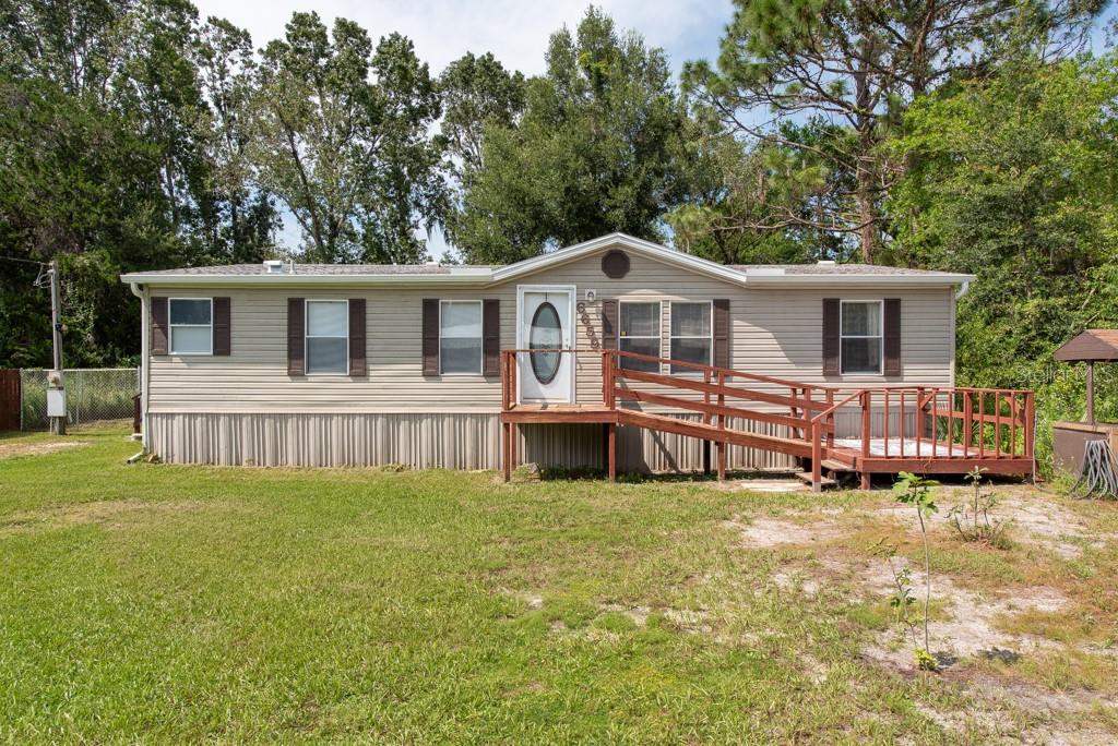 Short Sale. Your slice of paradise awaits! Nestled in the serene beauty of northern Florida, this 3-bedroom, 2-bathroom home sits on a tranquil half-acre lot, surrounded by lush trees and nature's peaceful embrace. Enjoy the freedom of no HOA or CDD fees, with countless outdoor activities right at your doorstep. Whether you’re into hiking, biking, fishing, boating, paddleboarding, kayaking, airboating, or snorkeling, this location offers it all. Explore nearby natural gems like Homosassa Springs, Crystal River National Park, 7 Sisters Springs, and Weeki Wachee, where you’ll encounter dolphins, sea birds, manatees, and turtles—a haven for nature lovers. The home boasts a spacious split-bedroom floor plan with an open living area and a cozy dinette, perfect for everyday living. The eat-in kitchen features updated appliances, while the dedicated laundry room offers extra storage. The primary bedroom impresses with a large closet, an ensuite bathroom with a double vanity, whirlpool tub, and a walk-in shower. The seller is offering select furniture pieces with the home for added convenience. This property operates on septic and well, with a brand-new water softener system. Enjoy nearby golf courses, distilleries, and restaurants in charming Homosassa. This is more than a home—it’s your gateway to a nature-filled paradise.