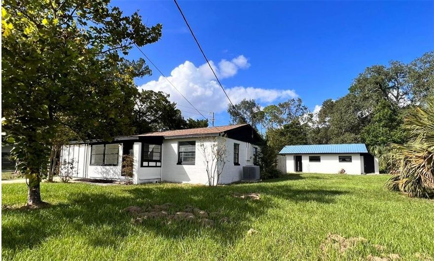 EXCITING COMPLETELY REMODELLED AND UPDATED FIRST HOME OR INVESTMENT PROPERTY! This is a 3 Bedroom, 2 bathroom, living room, kitchen, fenced in home with a detached huge 2 Car Garage with a workshop on the back. The home has a new roof as of 2023, new wood siding, freshly painted outside, newer air conditioner, newer electrical panel outside and with massive enclosed fence yard. The master bedroom has an updated bathroom and walk in shower. The house has a well and septic tank that was just cleaned and inspected. The property sits on a large corner lot with the house facing Debary street and the garage on the side street. The house and garage has a termite bond transferrable to the new owner. Water softener will need to be serviced. Buyer to verify room sizes, square footage, direction of the house and school district.