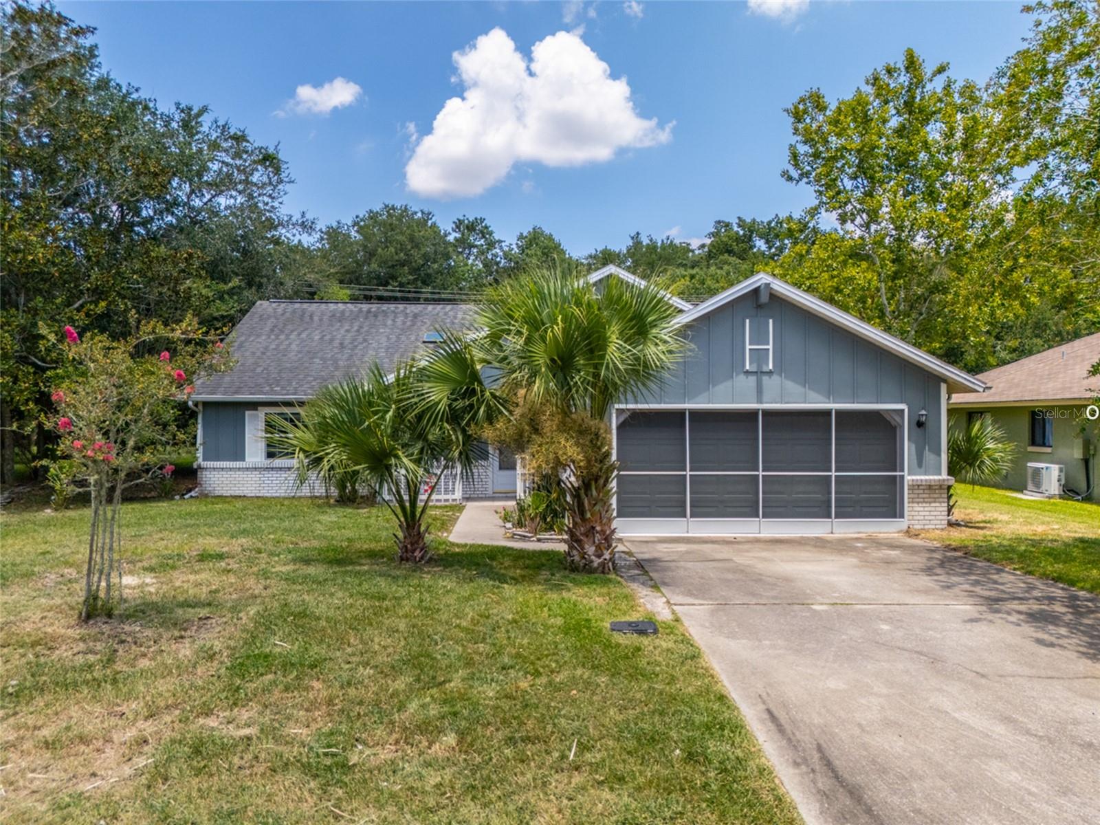 Spacious 3 Bed, 2 Bath Home in Sunny Palm Coast – Privacy, Comfort & $10K Seller Concession to make this home your style.
Welcome to your dream home in the highly desirable Woodlands section of Palm Coast, Florida! This 3-bedroom, 2-bathroom home offers 1,761 sq ft of comfortable living space on a beautifully private lot that backs up to undeveloped land – no rear neighbors!
Built in 1989, this home features a bright, open floor plan, perfect for entertaining and everyday living. Natural light flows throughout the space, enhanced by 3 solar light tubes and a skylight.
$10,000 seller concession – ideal for the upgrades and the personal touches you may want
Roof replaced in 2015
3.5-ton A/C unit (2018) – still in top condition- Its COLD IN THERE!
Brand-new hot water heater (installed January 2025)
Freshly painted exterior
Spacious 2-car garage with garage screening Garage screening offers several benefits, including improved airflow, pest control, privacy, and enhanced usability of the garage space. It can transform the garage into a more comfortable and functional area, whether for hobbies, workouts, or relaxation. Attic Storage.
Huge Florida Room with windows & screens and a large screen room right off the Florida room. Tucked into a quiet, established neighborhood, this home offers both privacy and convenience, just minutes from shopping, dining, parks, and a short drive to the beach.
Don’t miss this opportunity to own a solid, move-in-ready home with room to make it your own. Schedule your showing today!