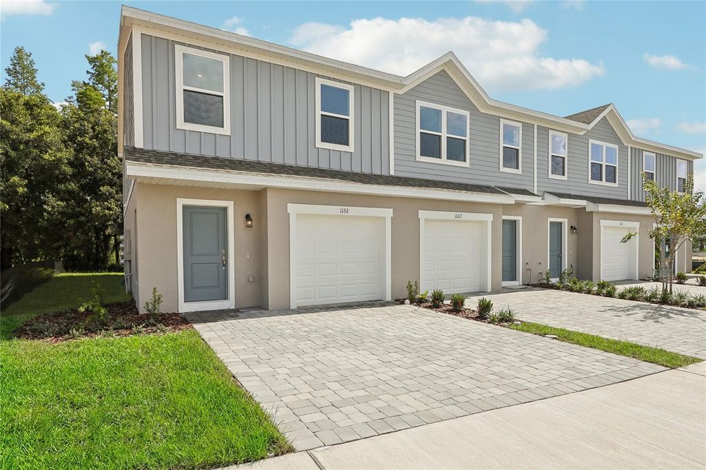 Photo of 1603 Fan Palm Drive, Davenport, FL 33897 (MLS # O6359424)