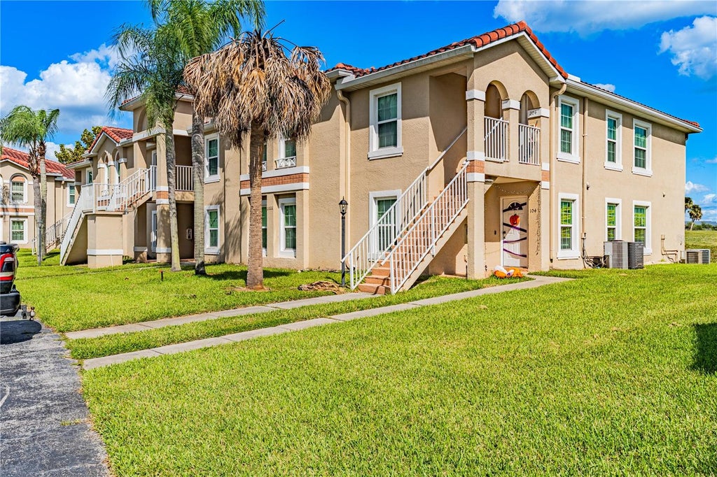Photo of 2824 Osprey Cove Place #102, Kissimmee, FL 34746 (MLS # O6451864)