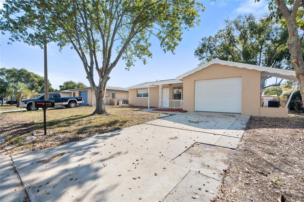 Photo of 7130 Fox Hollow Drive, Port Richey, FL 34668 (MLS # W7880976)