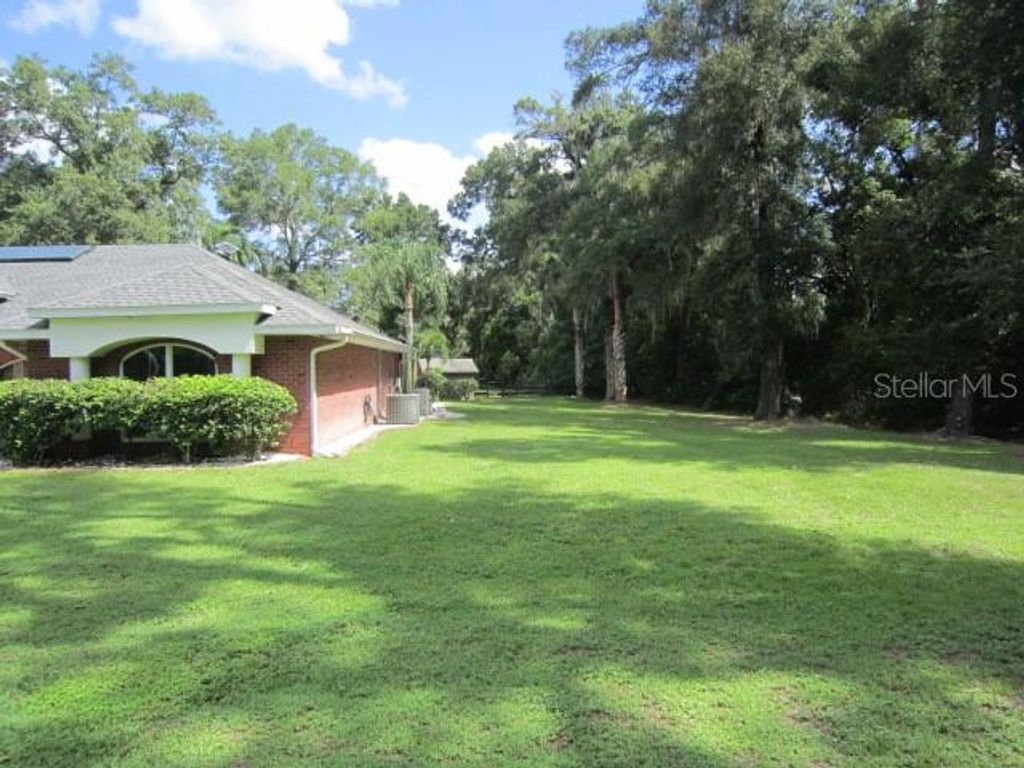Photo of 975 Rolling Acres Drive, Deland, FL 32720 (MLS # V4944432)